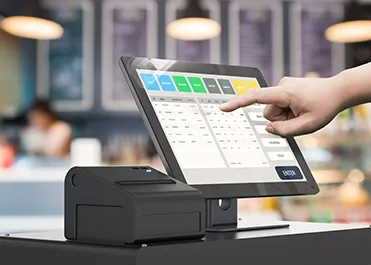 Employee using a POS system