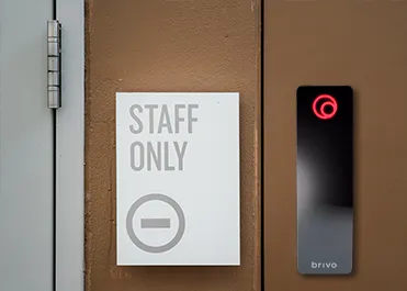 Access control reader on a staff entry door