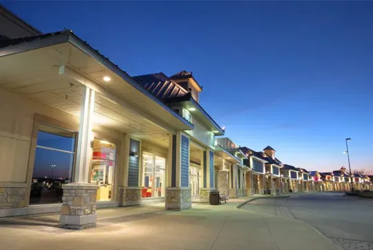 Shops closed for the evening with lights on
