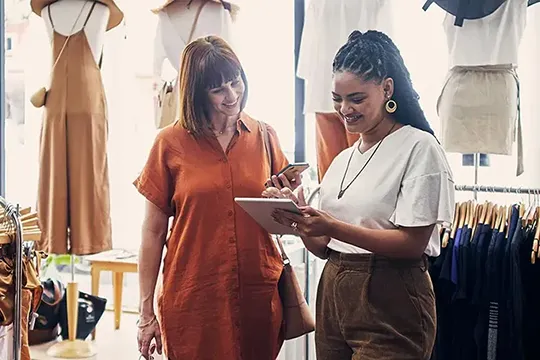 Retail employee helping a customer