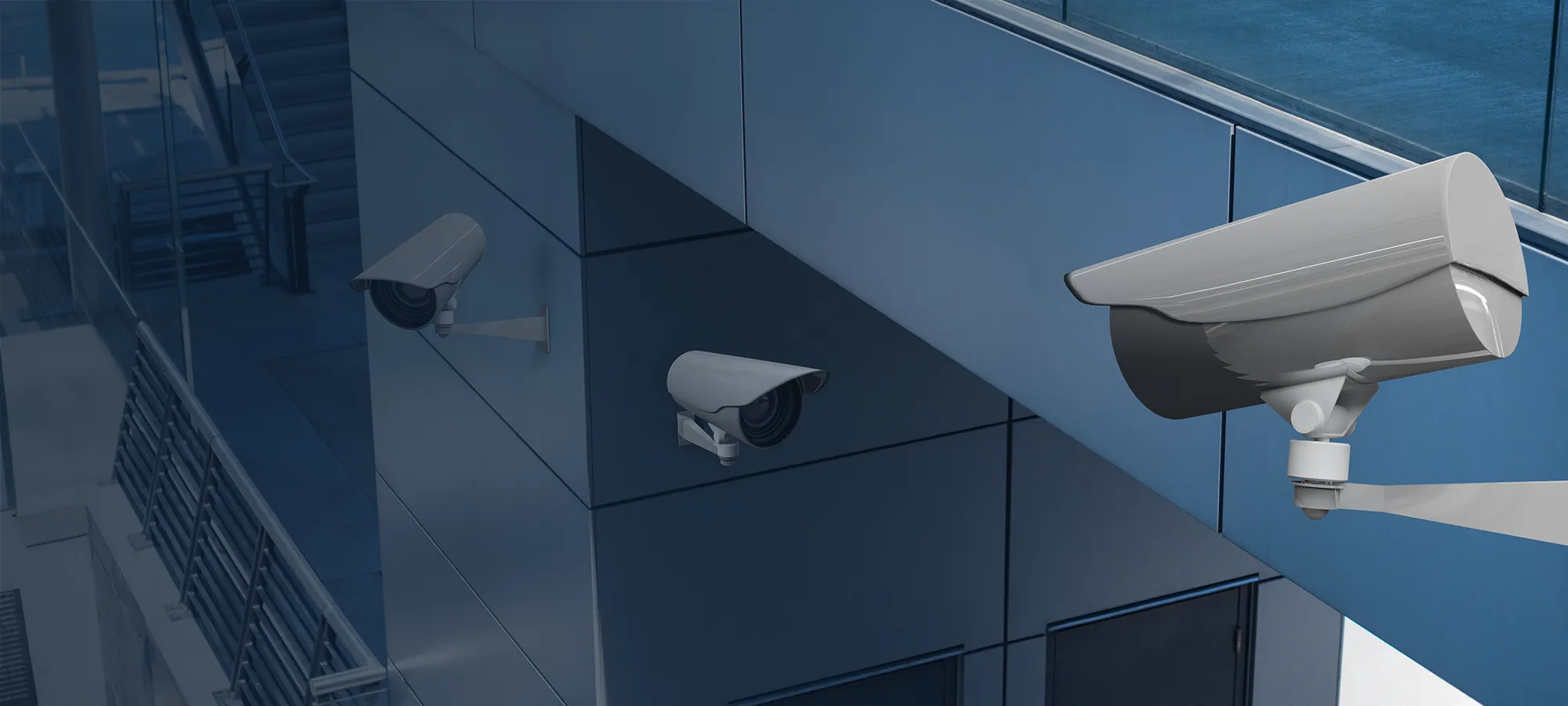 Commercial security cameras covering a business exterior.