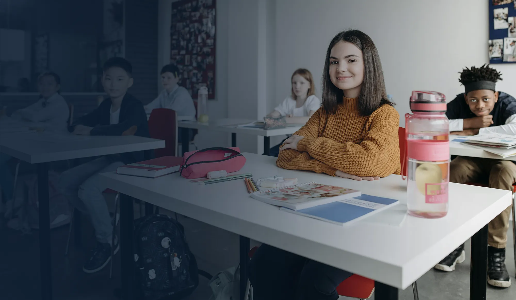 Middle school kids seated in a classroom