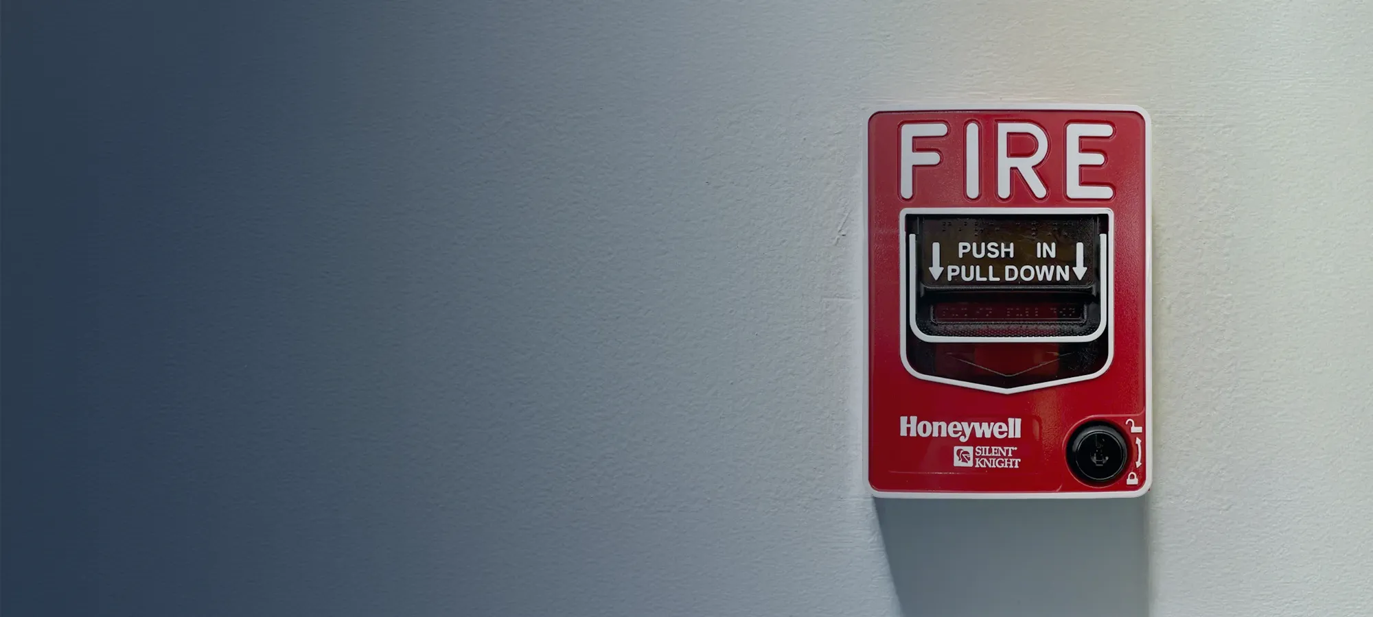 Fire alarm on wall in a commercial building.
