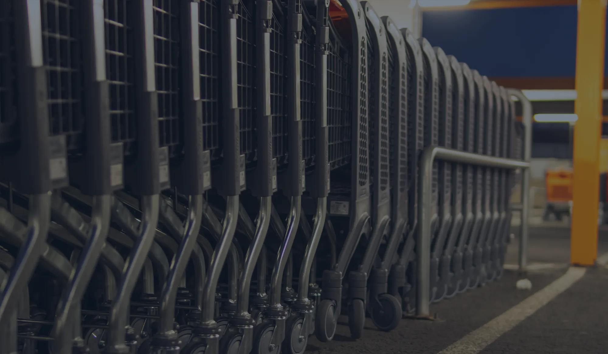 Closeup of a row of grocery carts