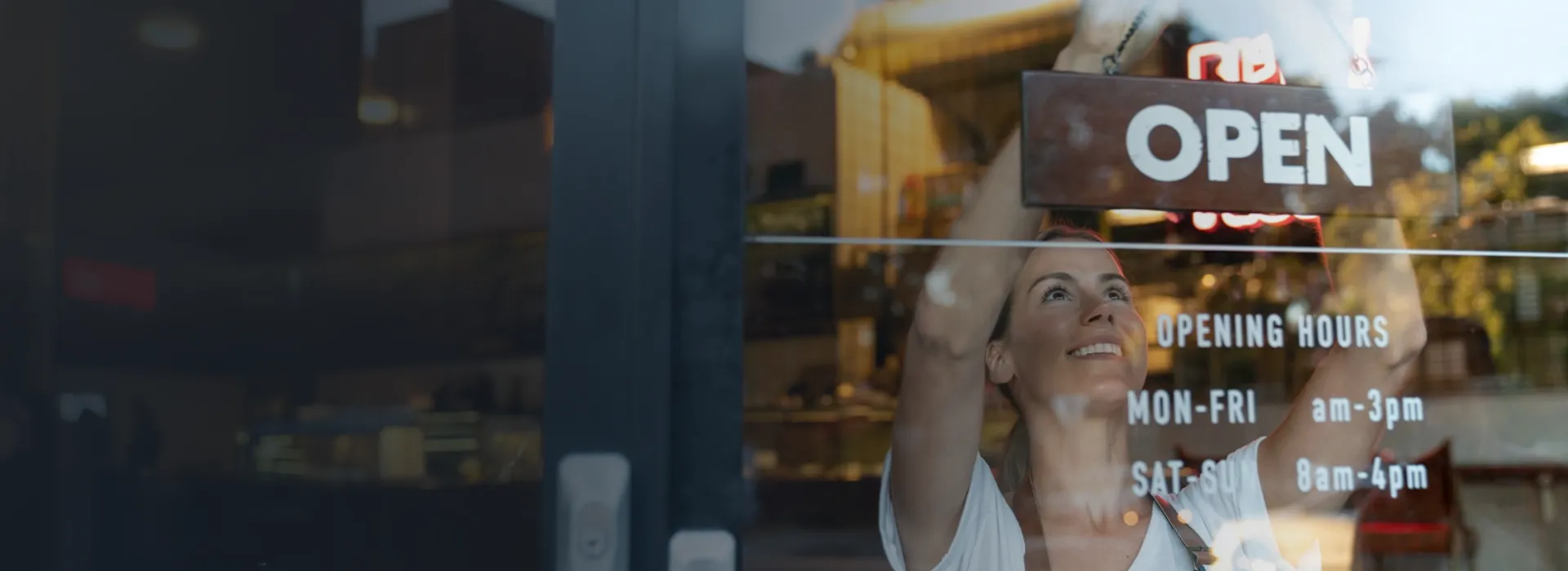 Small business owner opening store for the day