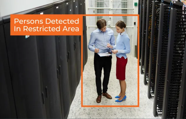 AI enhanced security video feed showing a label reading Persons Detected in Restricted Area