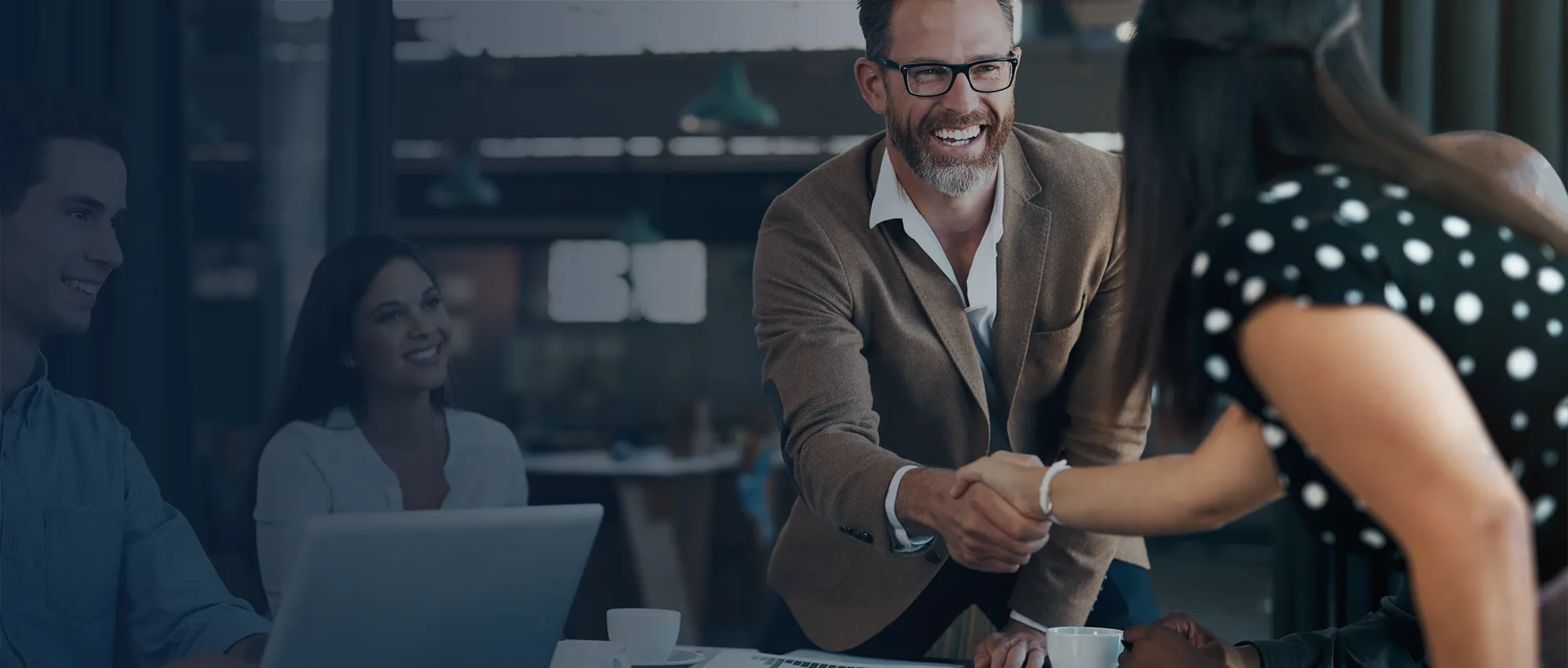 Business partners shaking hands.