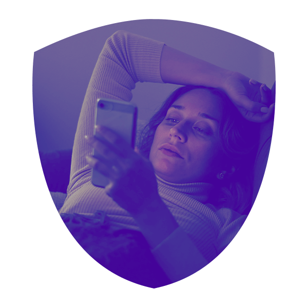 Image of woman looking at Guardian Protection app notifications