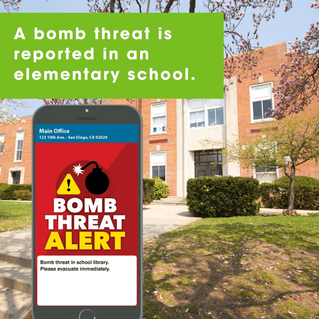 A cell phone receiving a mass notification about a bomb threat alert at an elementary school.