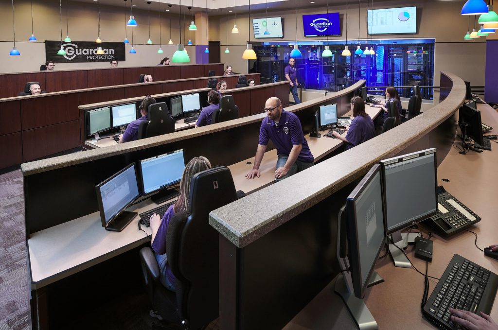 Home Security Specialists taking calls at Guardian Protection's Monitoring Center.
