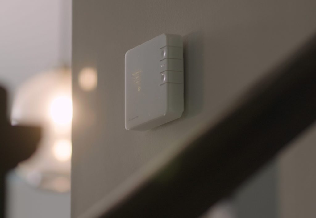 Image of Guardian Protection's smart thermostat in a home