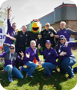 Guardian employees with Pirate Parrot and local Police at company's headquarters