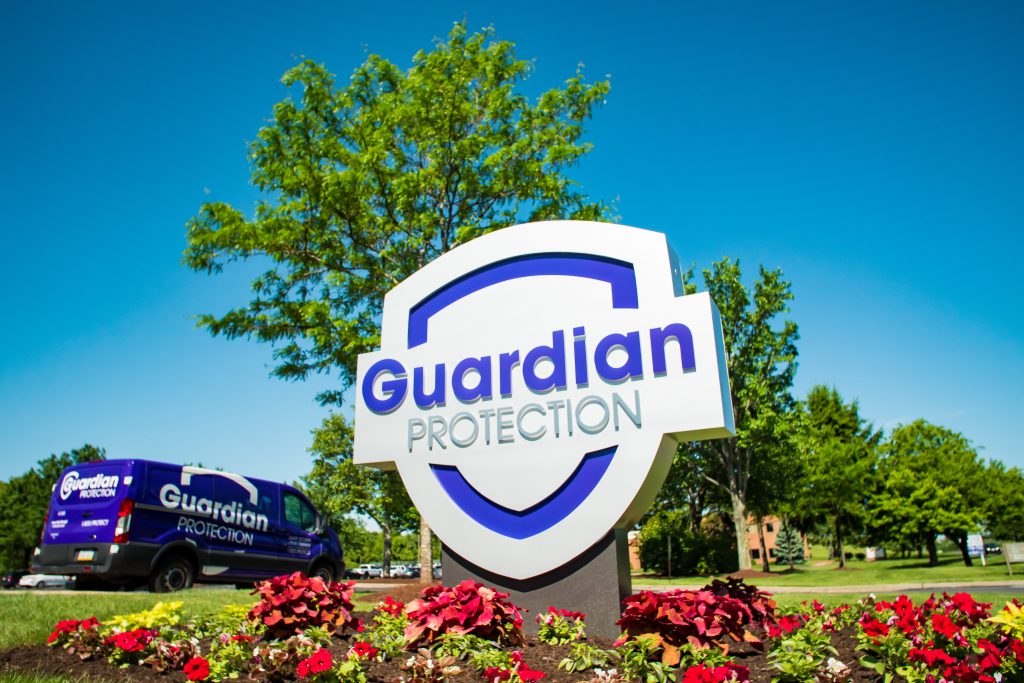 Guardian Protection sign and van