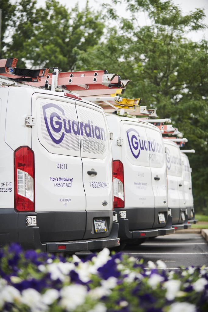 Back of Guardian Protection vans