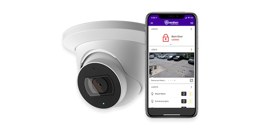 Commercial security camera and smart phone opened to the Guardian Protection app