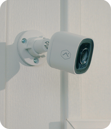 Outdoor security camera installed on home's exterior