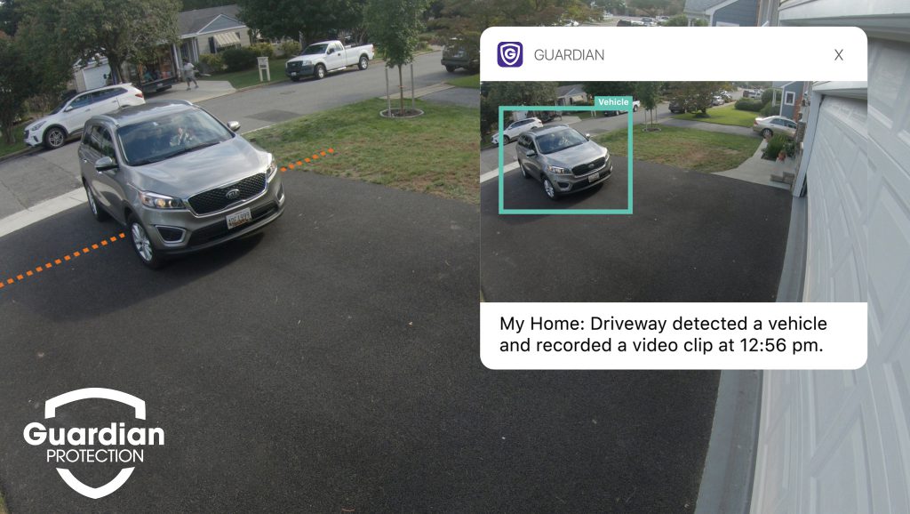 Guardian Protection app notification from home security cameras showing a car crossing a tripwire