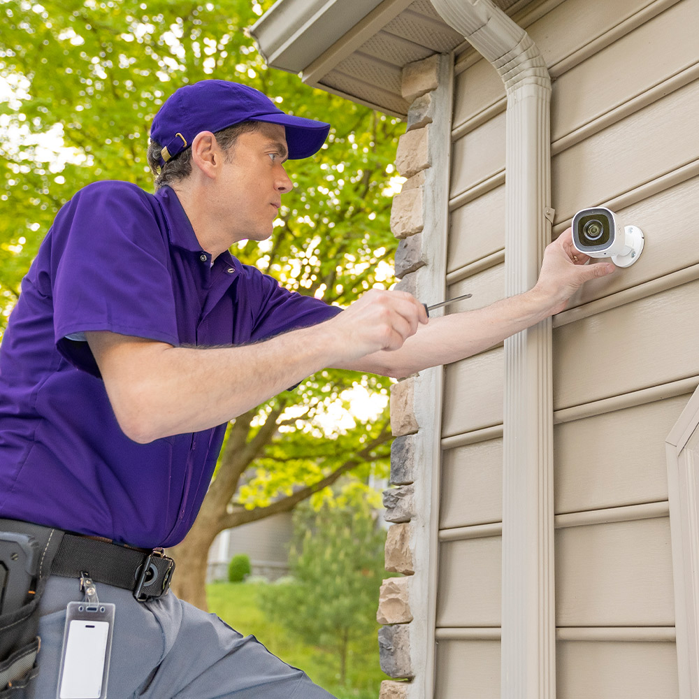 Guardian Protection security expert professionally installing home security equipment