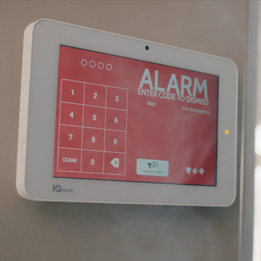 Guardian Protection security panel showing a fire detection alert