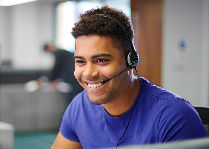 Guardian Protection Security Specialist wearing a headset.