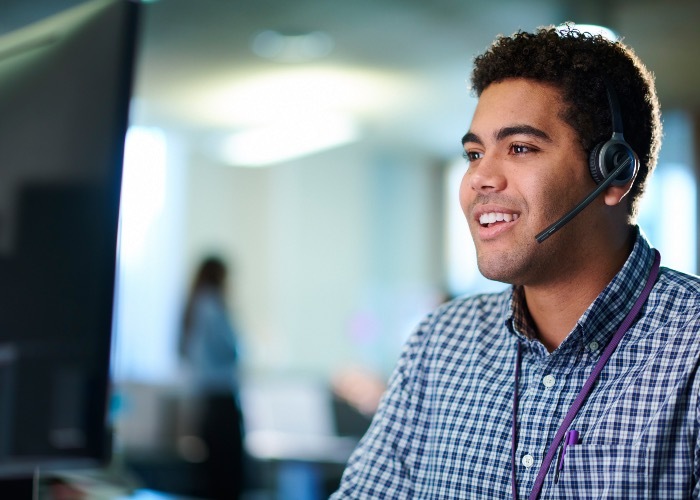 Guardian Protection Specialist on the phone with a customer