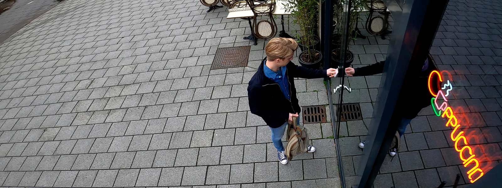 Person using Guardian Protection's access control to get into a building caught on business security camera