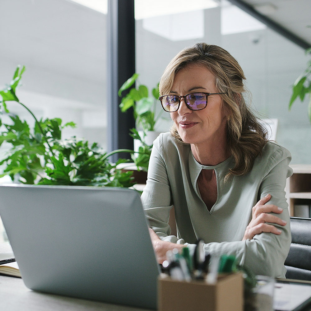 Woman looking at her laptop screen