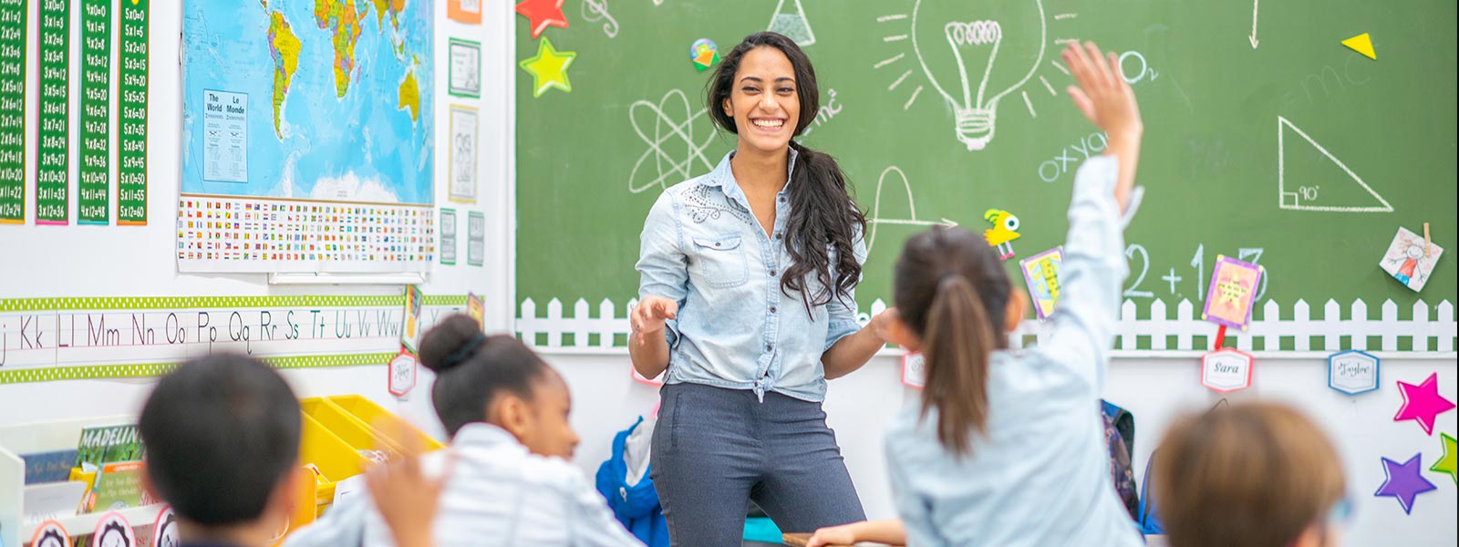 Teacher in front of classroom 