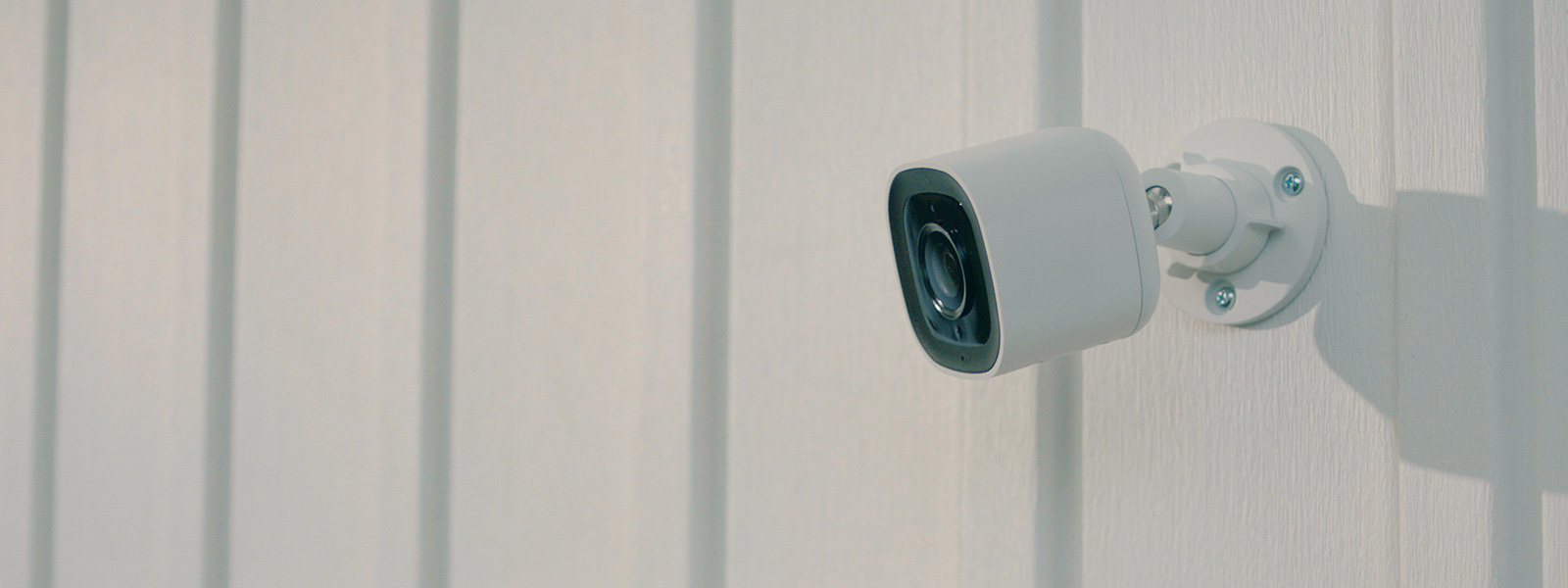 Guardian Protection outdoor home security camera mounted to a home's exterior wall.