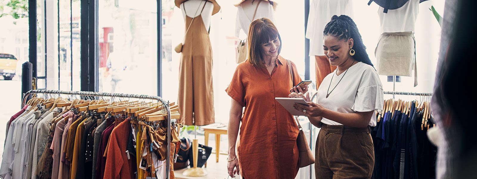 Retail employee and customer in store 