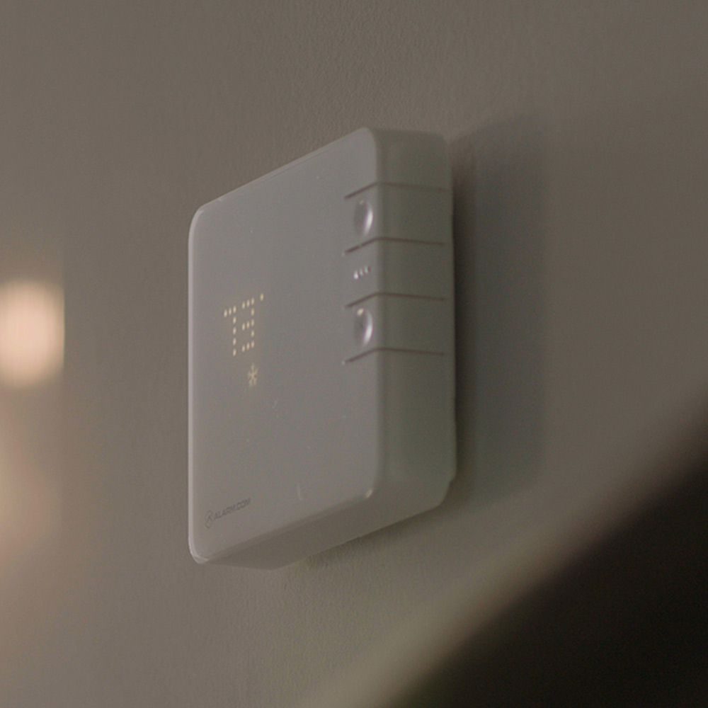 Guardian Protection smart thermostat on wall