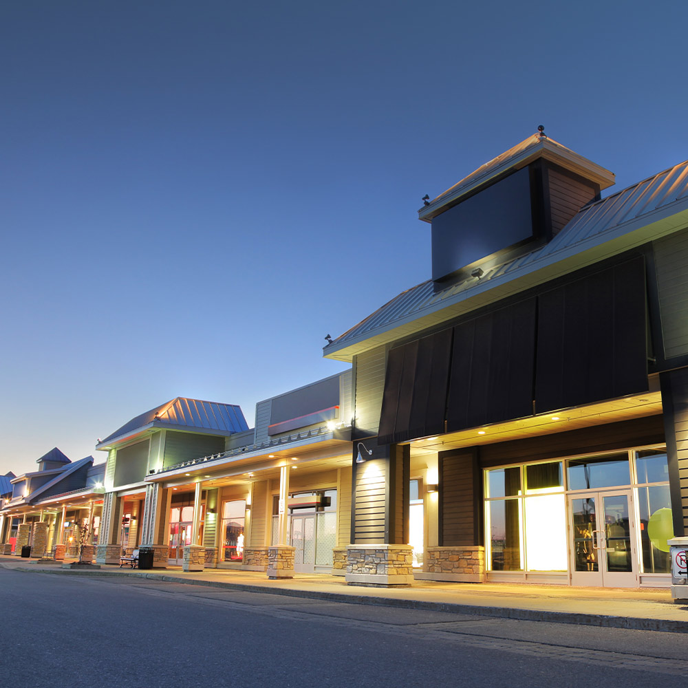 Row of chain stores in a shopping center