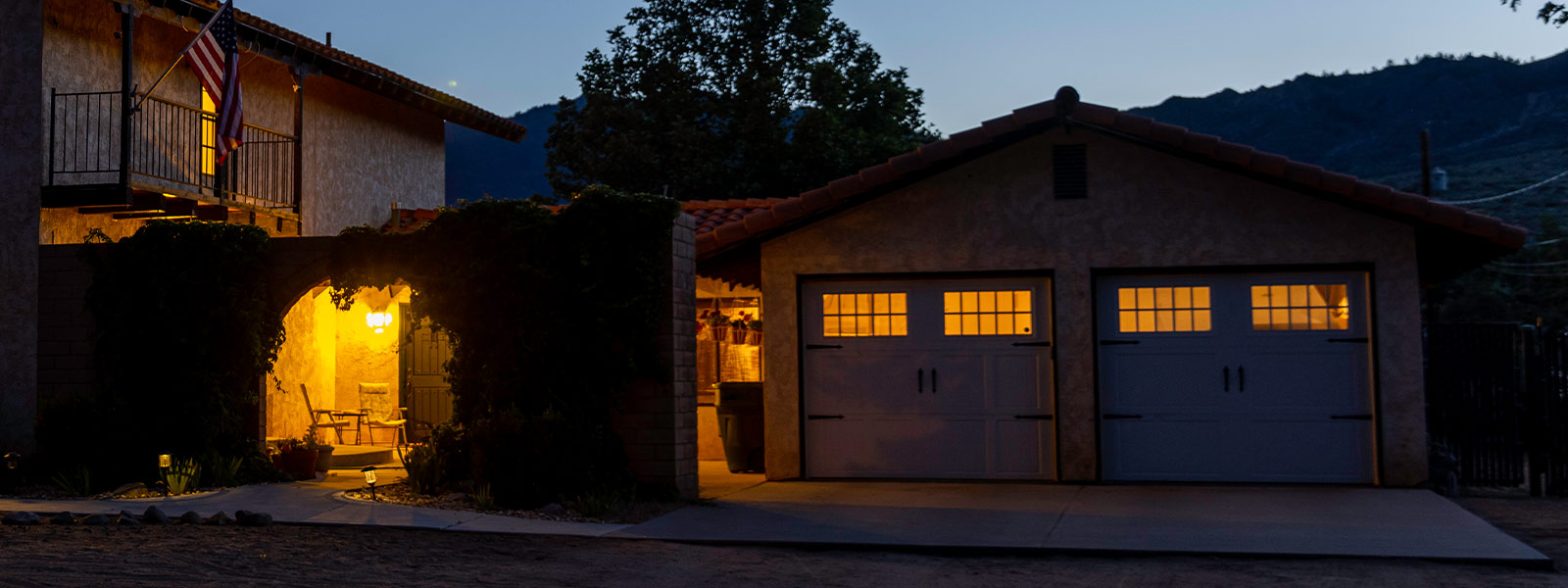 A house at night with the lights turned on